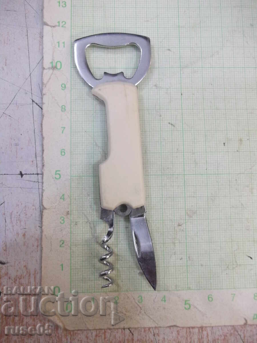 Delivery of Bottle opener with corkscrew and knife