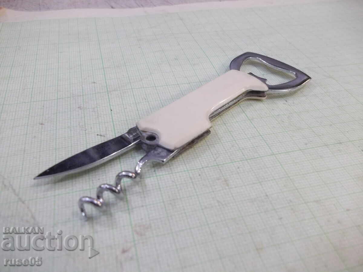 Bottle opener with corkscrew and knife - 7