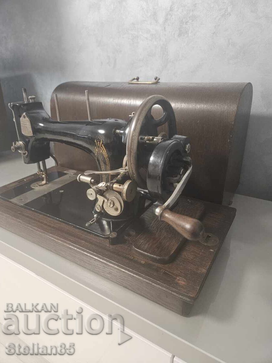 Auction Hand-crank sewing machine Auction Hand-crank sewing machine