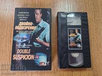 Caseta video VHS - Suspiciune dublă