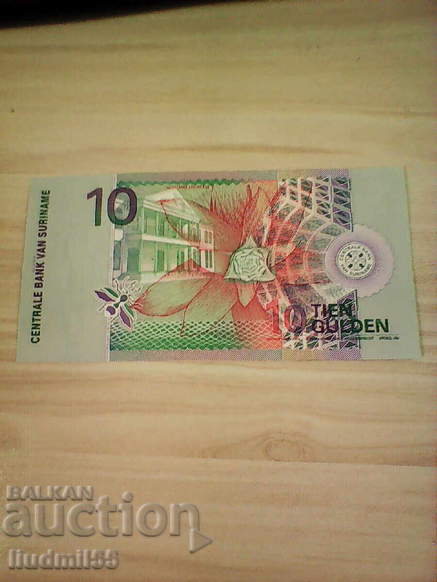 СУРИНАМ - 10 ГУЛДЕНА - 2000г - UNC с цена 5.00 лв. | € 2.56 СУРИНАМ - 10 ГУЛДЕНА - 2000г - UNC с цена 5.00 лв. | € 2.56