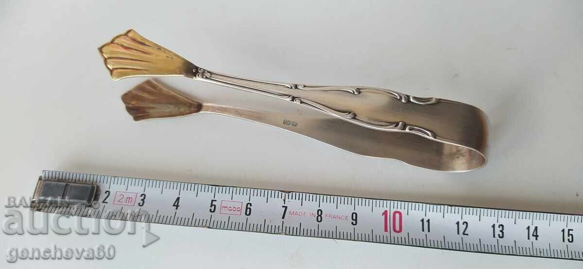 Livrarea Clește antic din argint, aurit