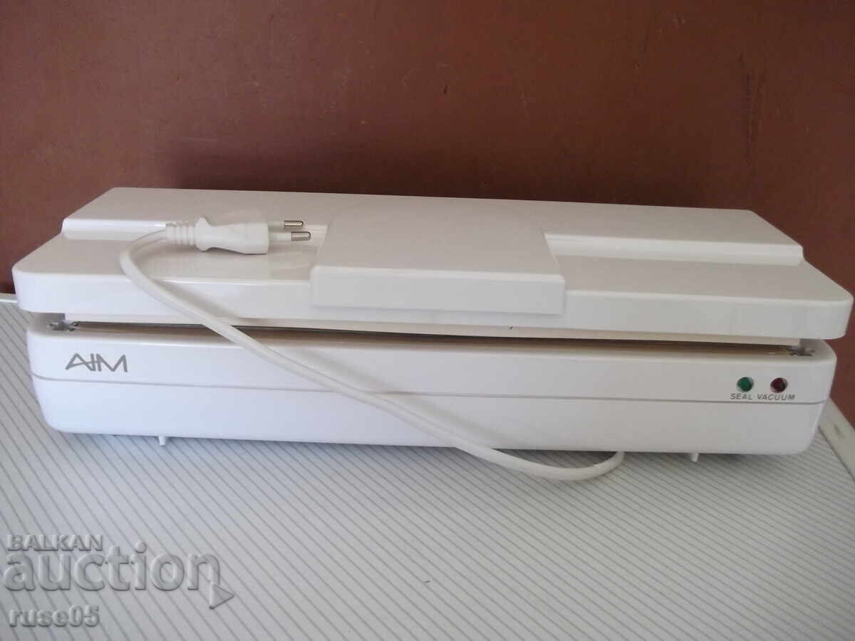 Аукцион Машина "AIM - BS-827" за вакуумиране и запечатване нова