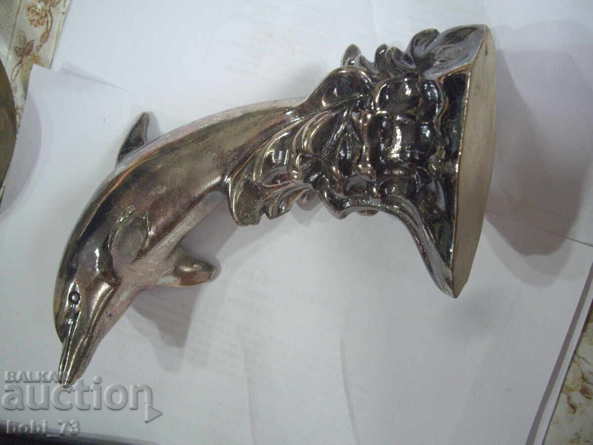 Interesting dolphin figurine