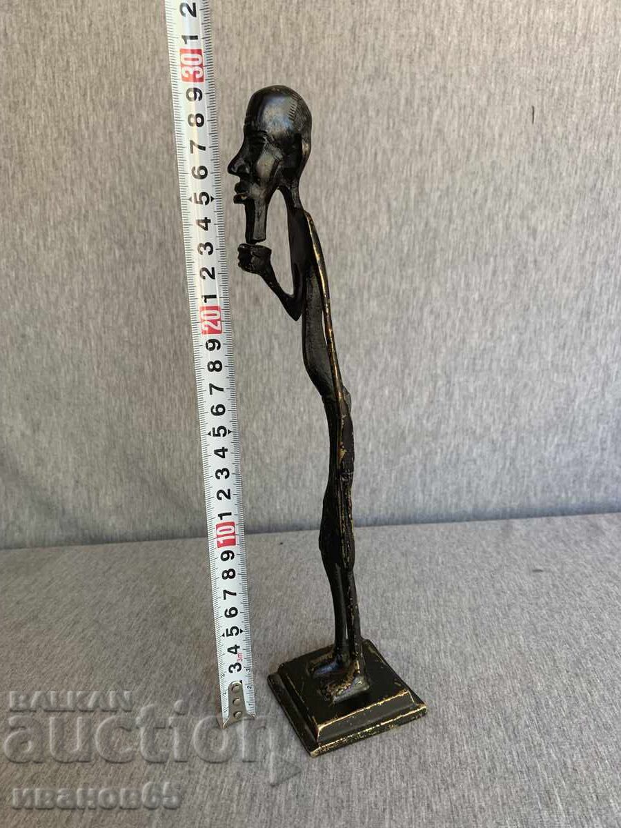 Auction Bronze/Brass statue of an African tribal person Auction Bronze/Brass statue of an African tribal person