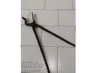 Old blacksmith's tongs, shingles, wrought iron