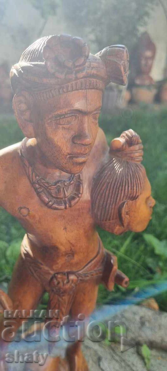 Auction Wooden figure. Cannibal Auction Wooden figure. Cannibal