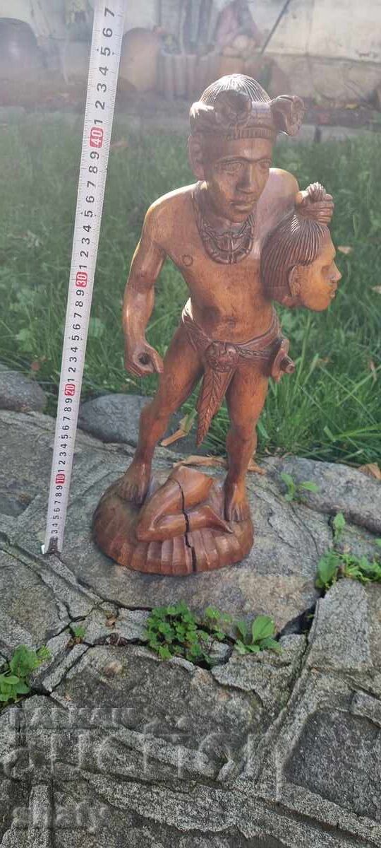 Wooden figure. Cannibal Wooden figure. Cannibal