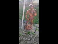 Wooden figure. Cannibal