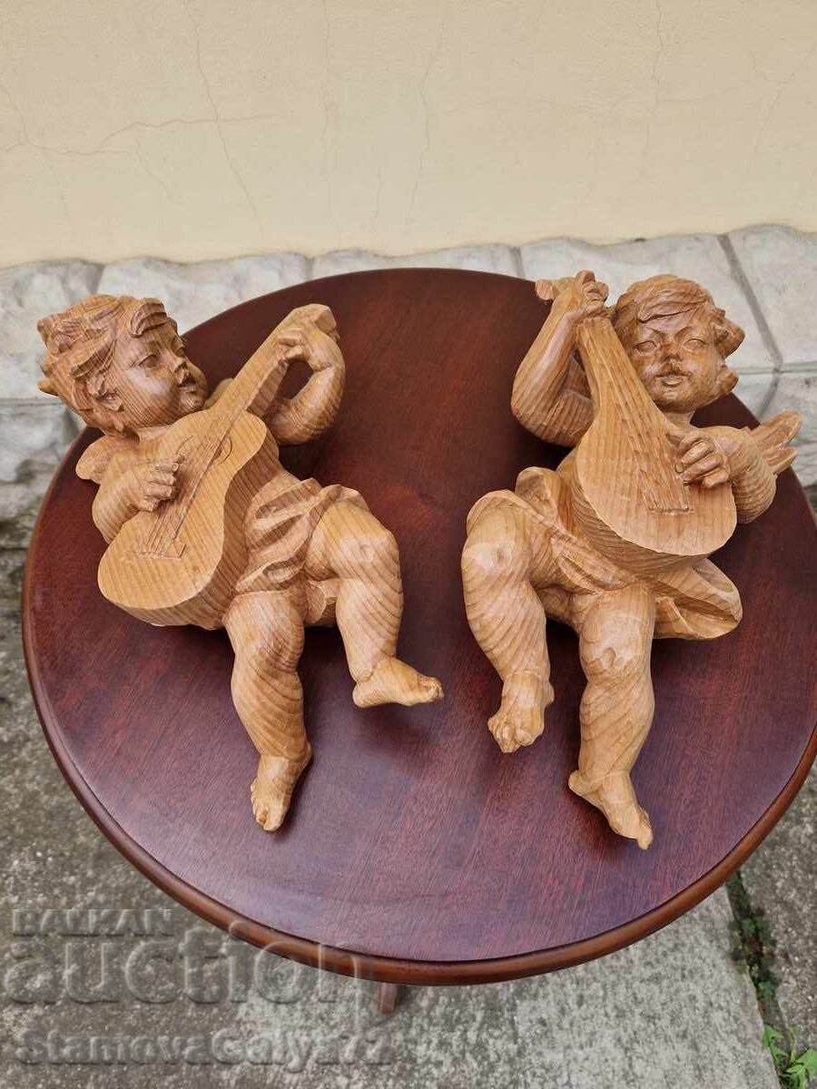 Auction Pair of Unique Antique Wooden Angel Figures Auction Pair of Unique Antique Wooden Angel Figures
