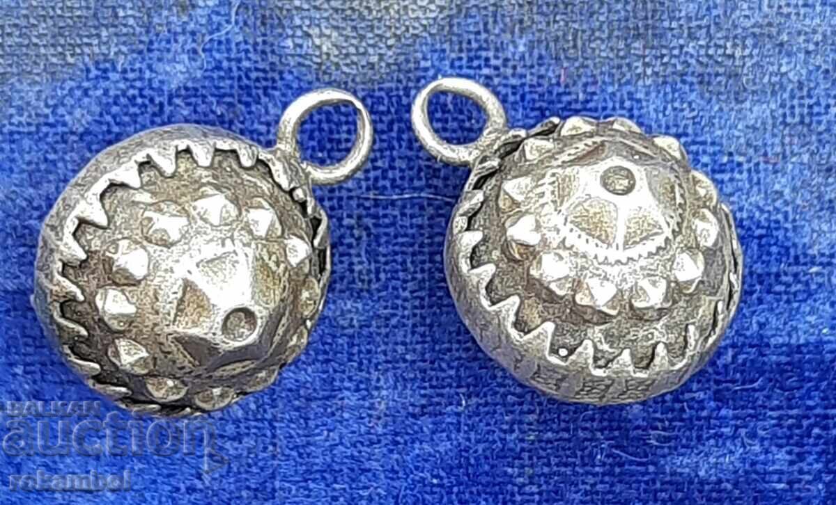 Delivery of Two silver ethnographic beads for a belt, rosary