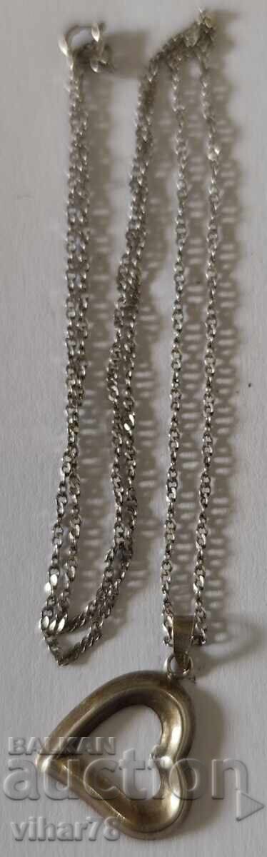 Delivery of SILVER PENDANT