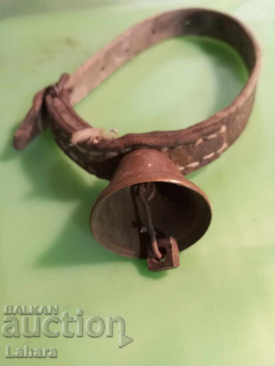 Auction  Bell, chan, clapper with a leather strap