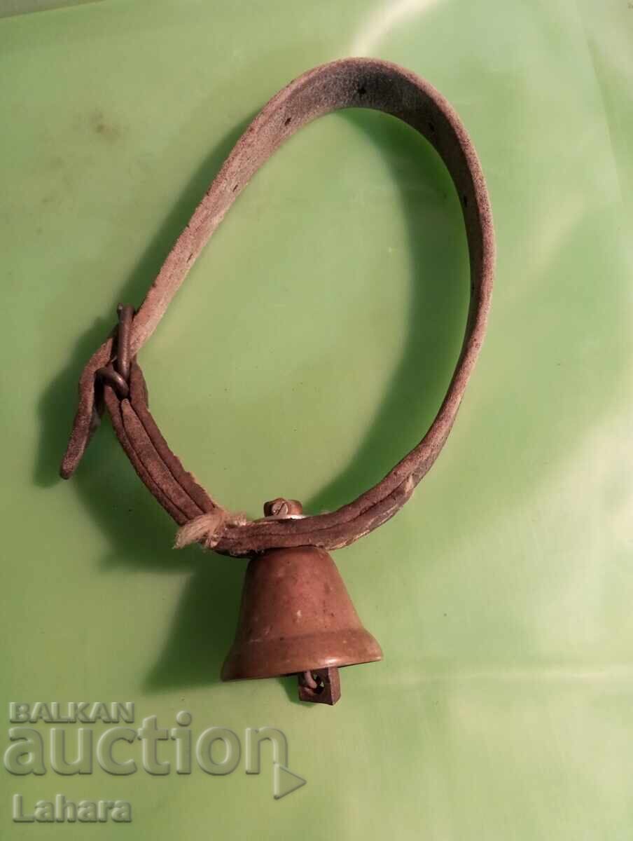 Bell, chan, clapper with a leather strap