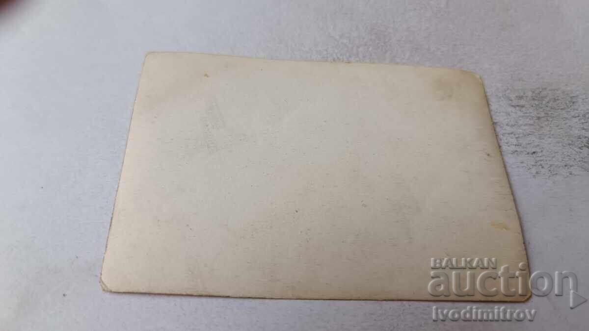 Auction  Photo of Two Young People in Front of an Unplastered Newly Built Building