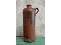 Винтидж, антична, керамична бутилка със дръжка