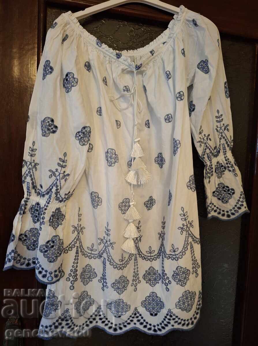 Fashionable white long shirt with beautiful cutwork embroidery