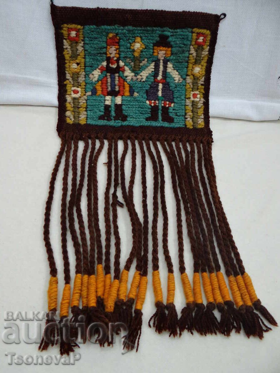 Unique hand-embroidered wall hanging with fringe