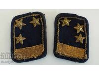 Σοσιαλιστικά κουμπιά από σιδηροδρομική στολή