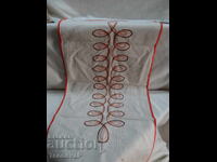 Embroidery in orange and brown