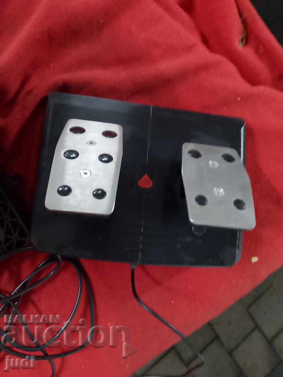 Auction  Genesis game with steering wheel and pedals