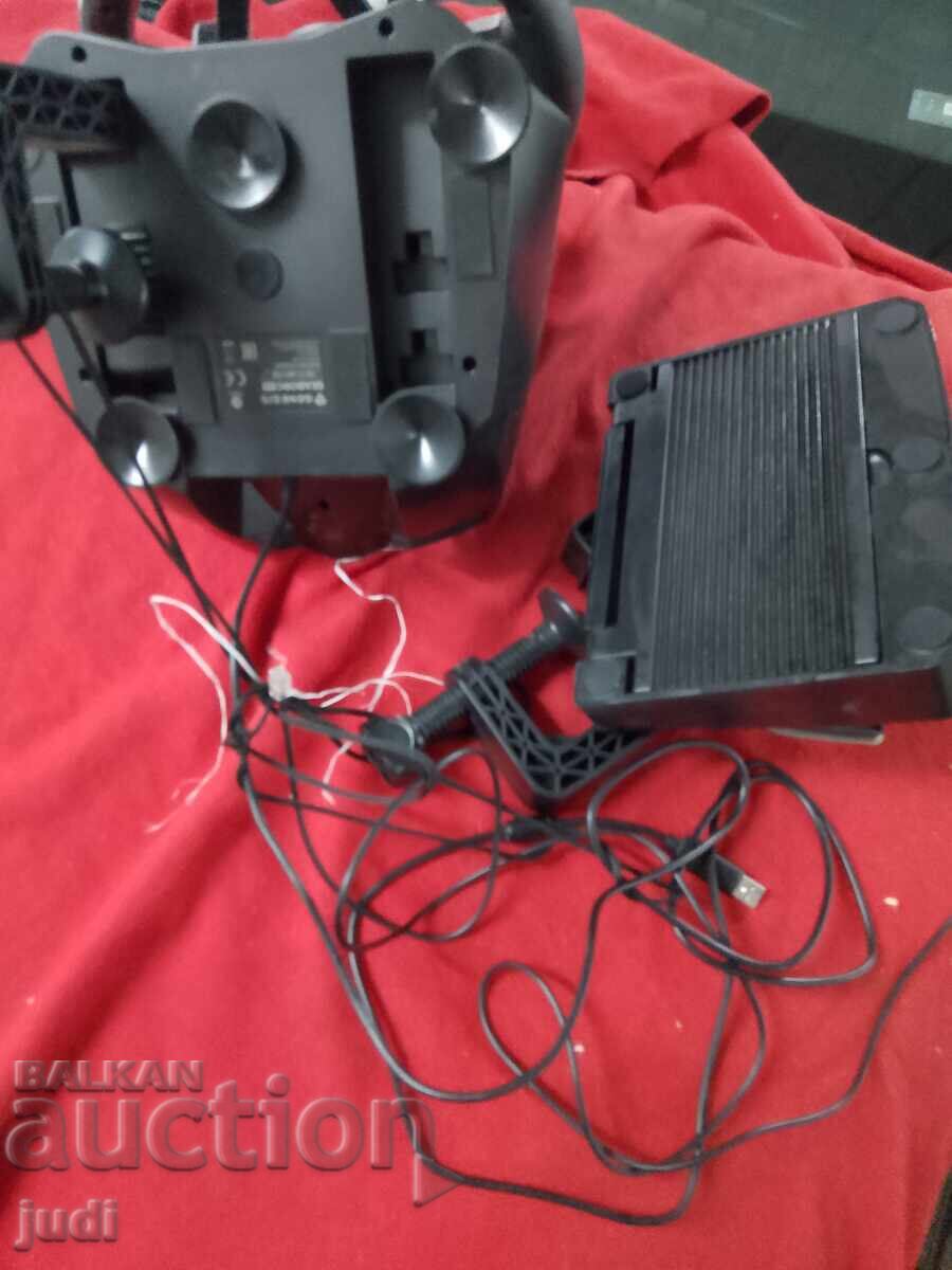 Delivery of Genesis game with steering wheel and pedals