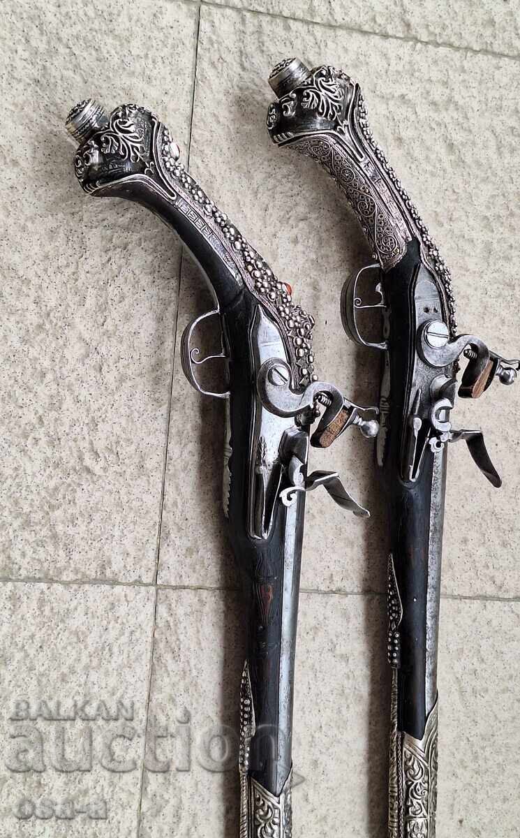 Auction  A pair of shotgun revolver pistols