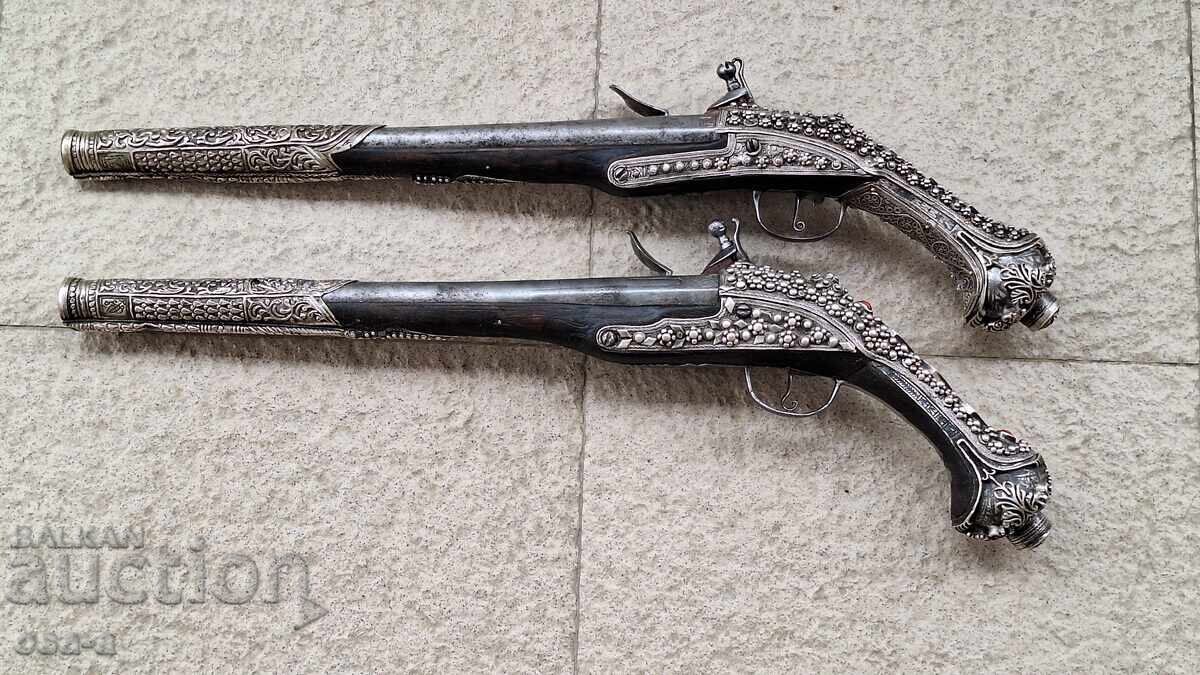 Delivery of A pair of shotgun revolver pistols