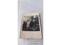 Photo Kyustendil Men and women in front of the monument of Ilio Voyvoda