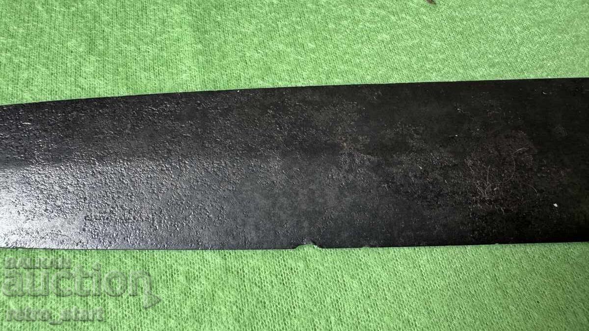 Delivery of Machete with a brass handle