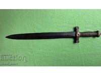 Machete with a brass handle
