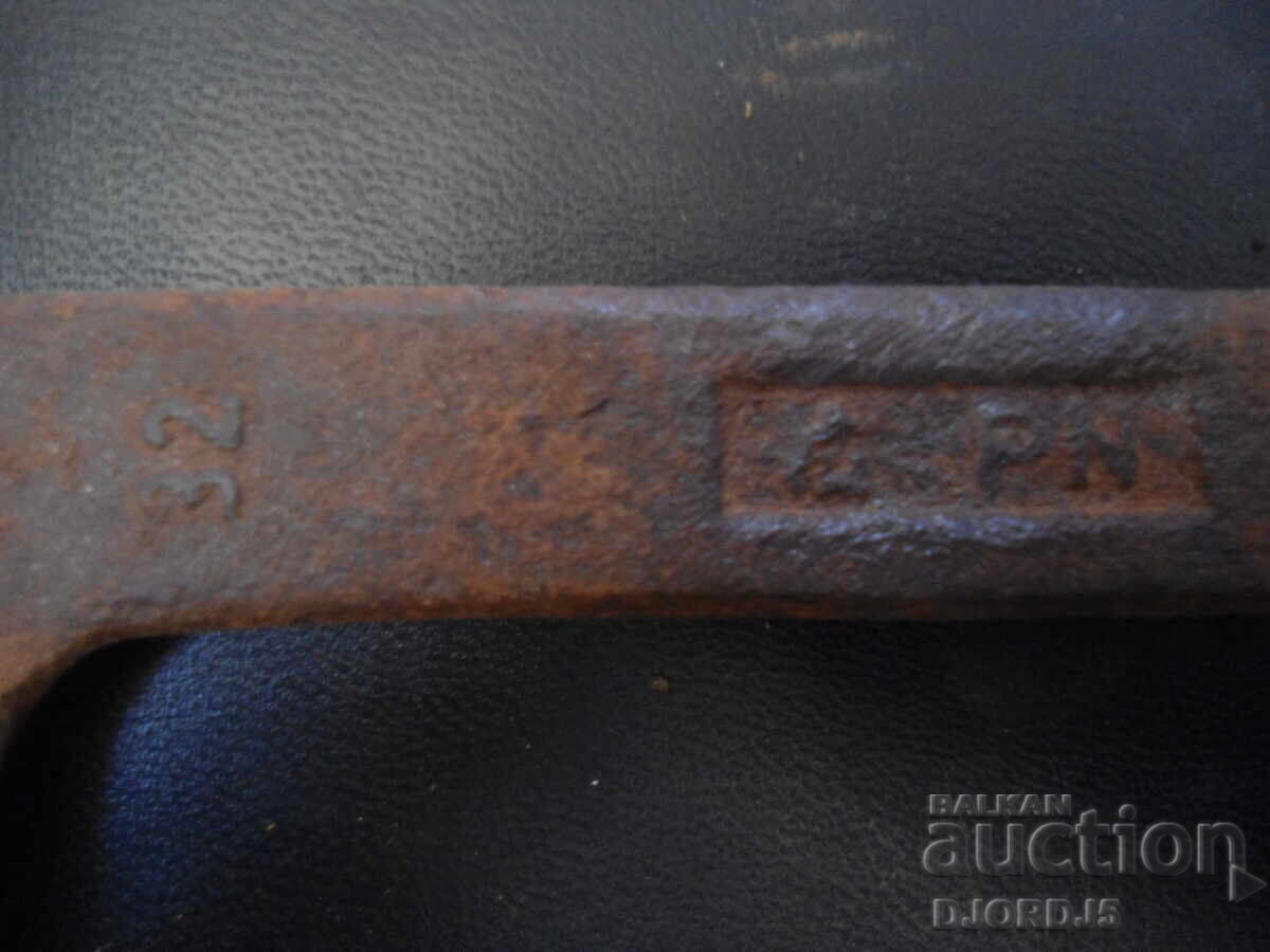 Auction  Old 32 bar wrench, marked