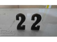 Cifre de pe uniformă, probabil BA