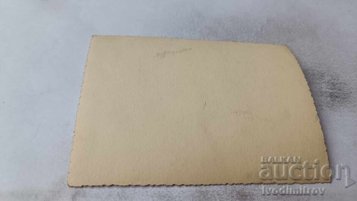 Снимка Младо момиче с бял ретро бански на плажа с цена 2.35 лв. | € 1.20