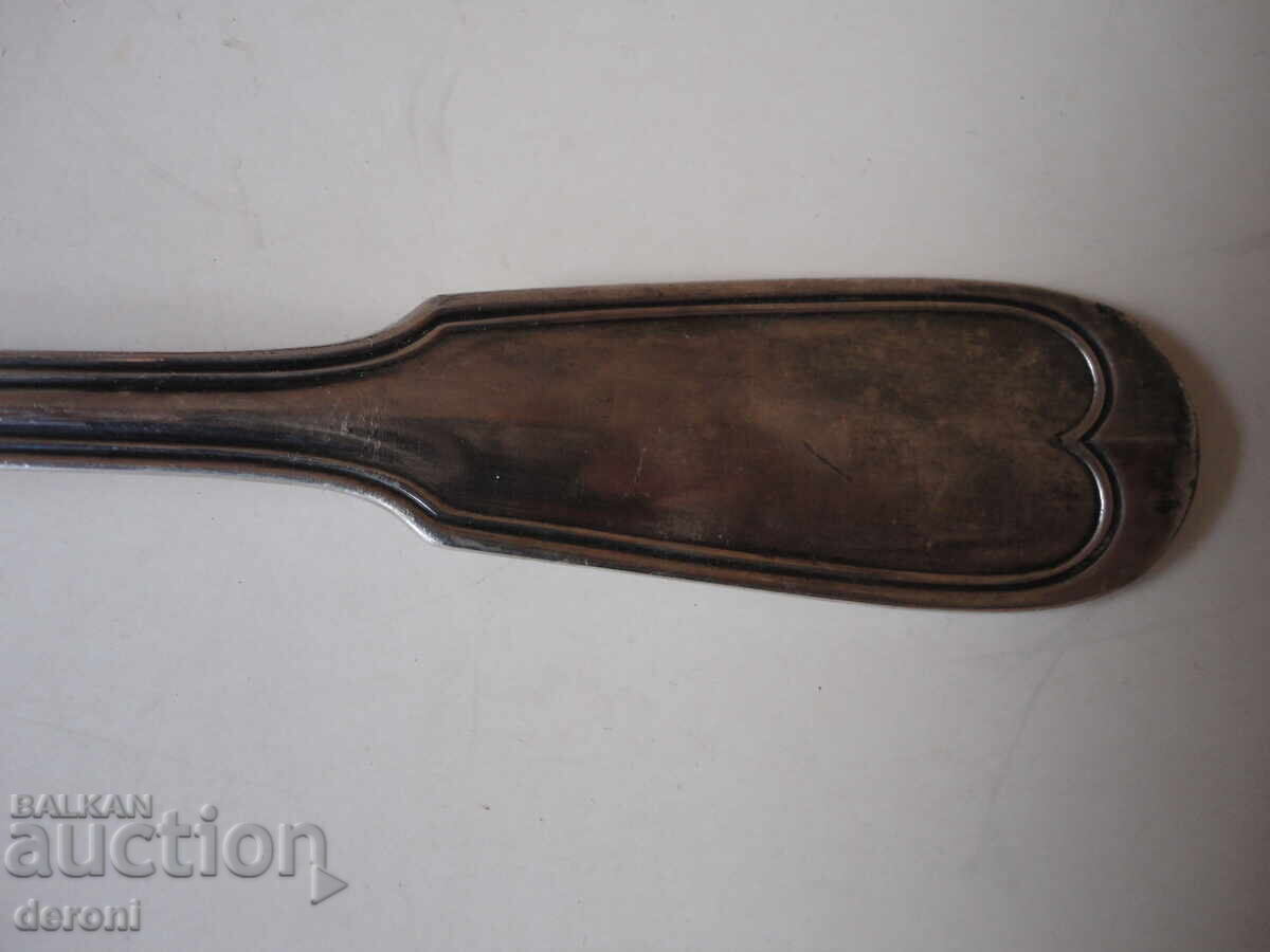Auction  Large silver-plated ladle, marked