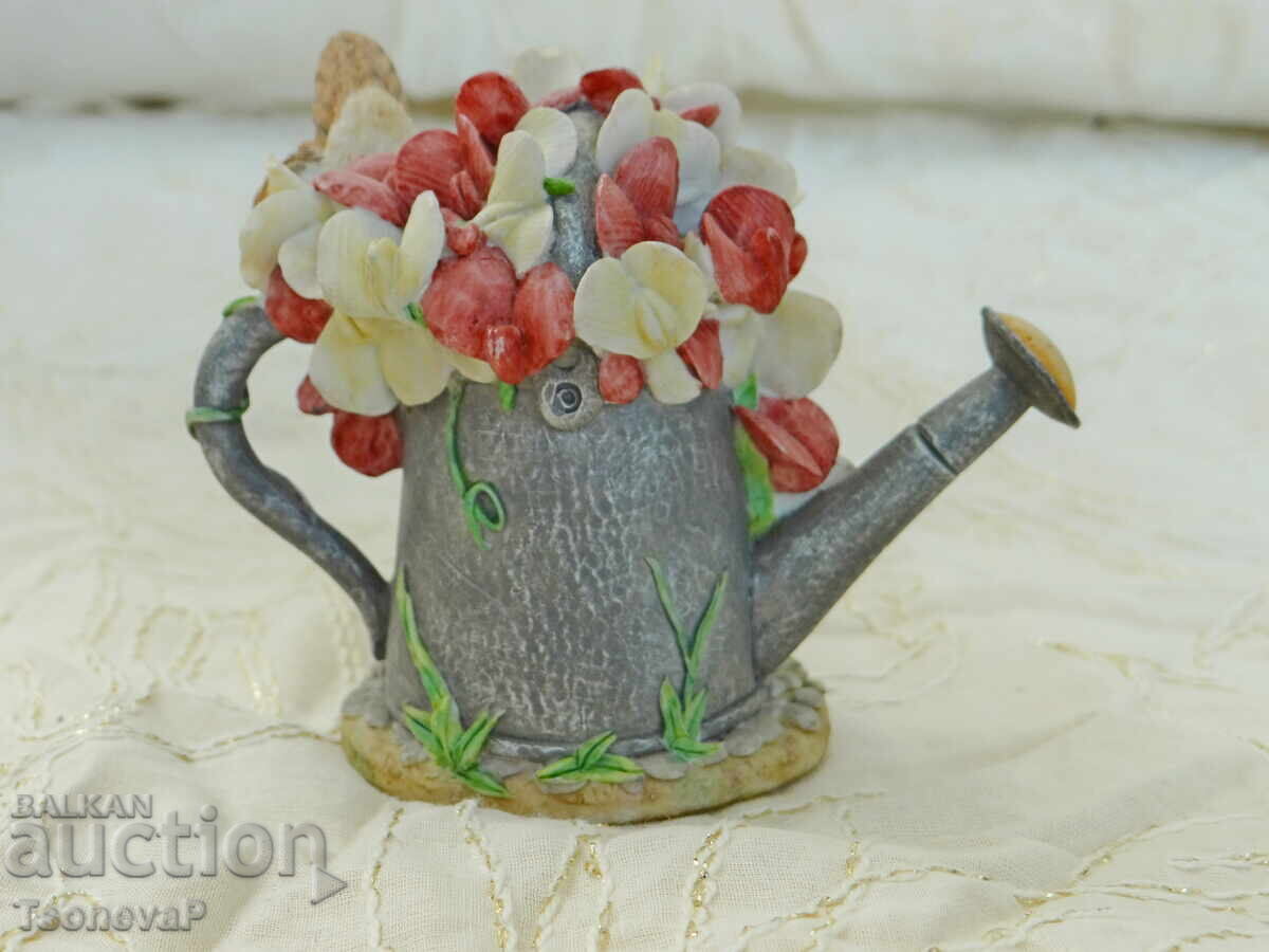 Bird figurine, watering can, flowers, butterfly with price 6.00 BGN | € 3.07 Bird figurine, watering can, flowers, butterfly with price 6.00 BGN | € 3.07