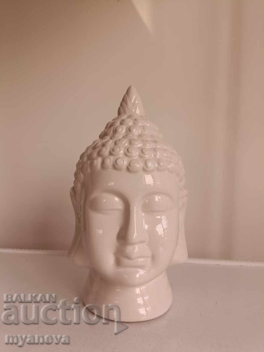 Auction Porcelain Buddha Head in Relaxed and Meditative Pose Auction Porcelain Buddha Head in Relaxed and Meditative Pose