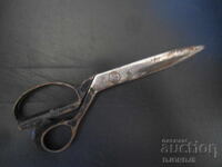 Παλιό ψαλίδι, σημειωμένο