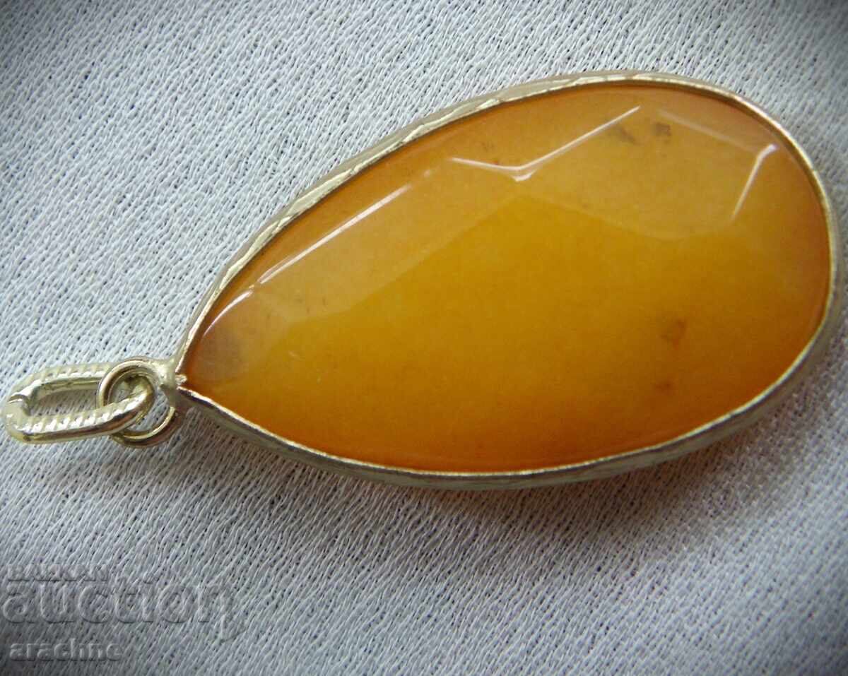 Large gold-plated pendant with hessonite garnet with price 120.00 BGN | € 61.36