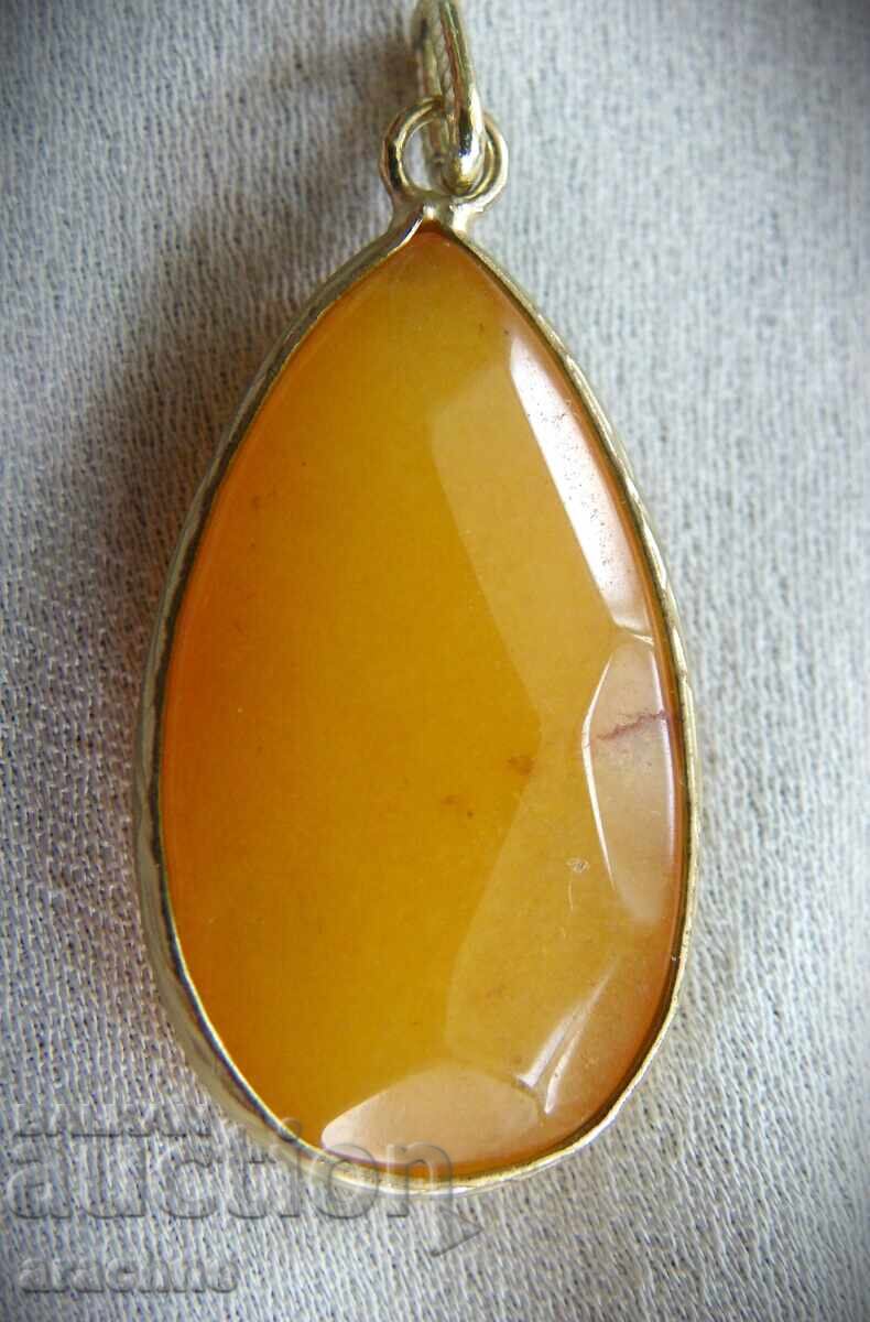 Auction  Large gold-plated pendant with hessonite garnet
