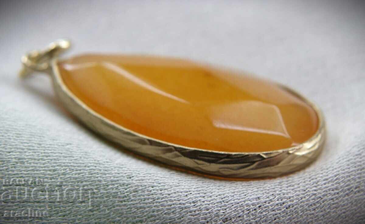 Delivery of Large gold-plated pendant with hessonite garnet