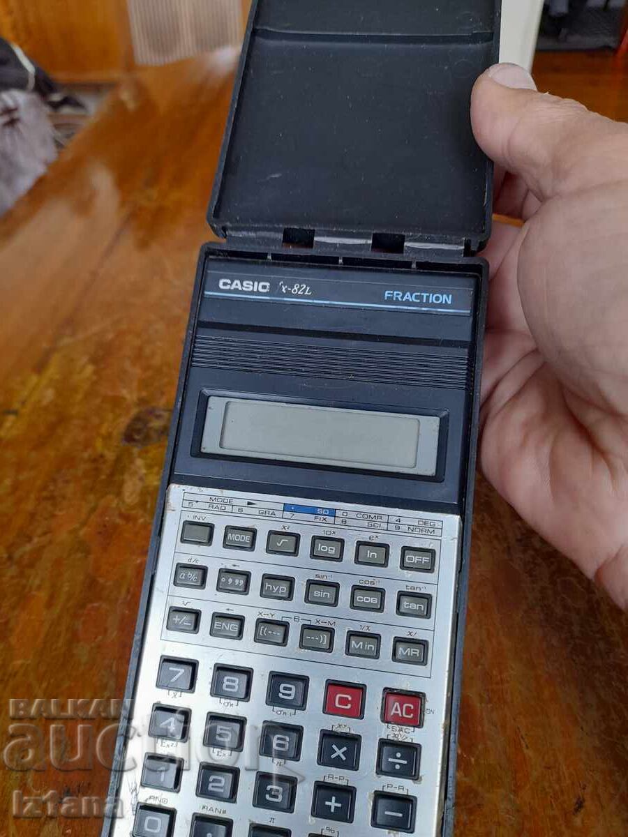 Auction  Old Casio FX-82L calculator