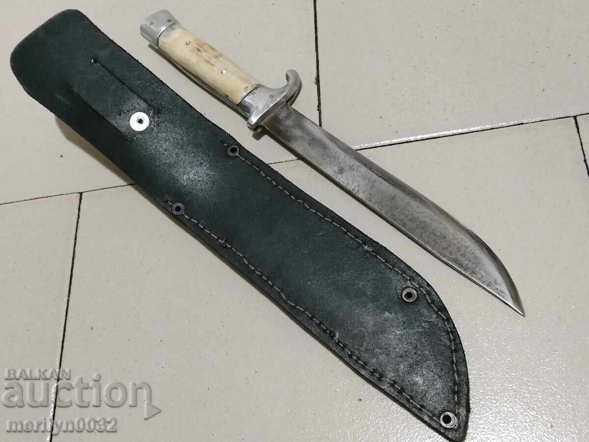 Auction  Hunting knife with sheath, deer antler handle, crossguard