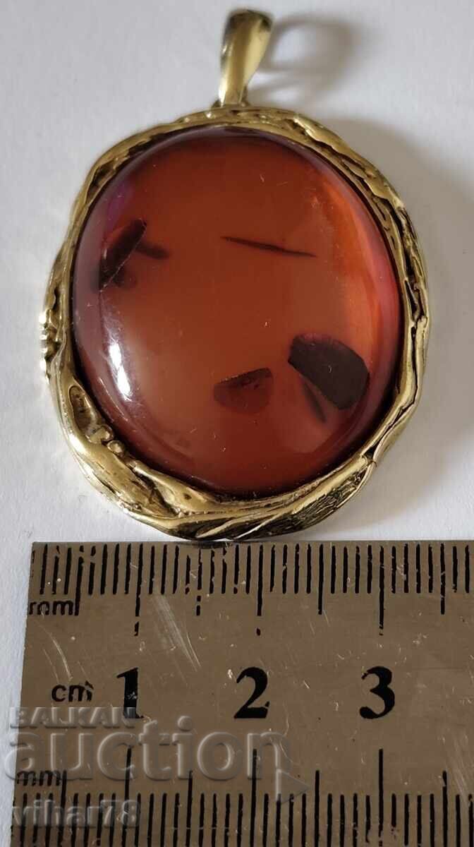 Delivery of Silver pendant with gold plating and amber
