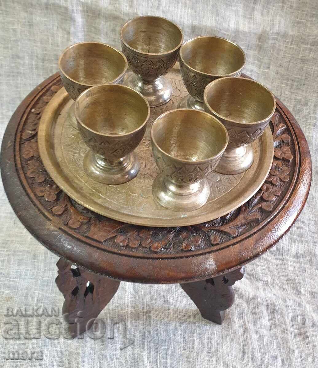 Auction  Old Arabic wooden table and set of hand-forged cups