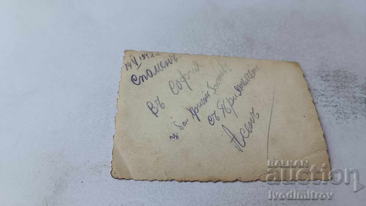 Photo Sofia Two young men next to a retro car 1942 with price 2.45 BGN | € 1.25