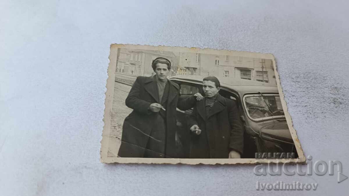 Photo Sofia Two young men next to a retro car 1942