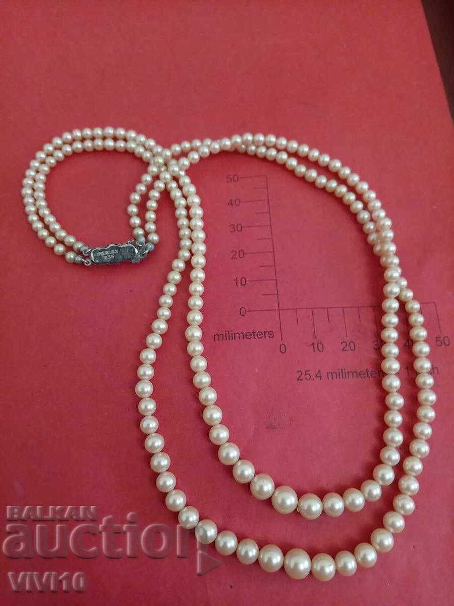 Antique pearl necklace, silver clasp