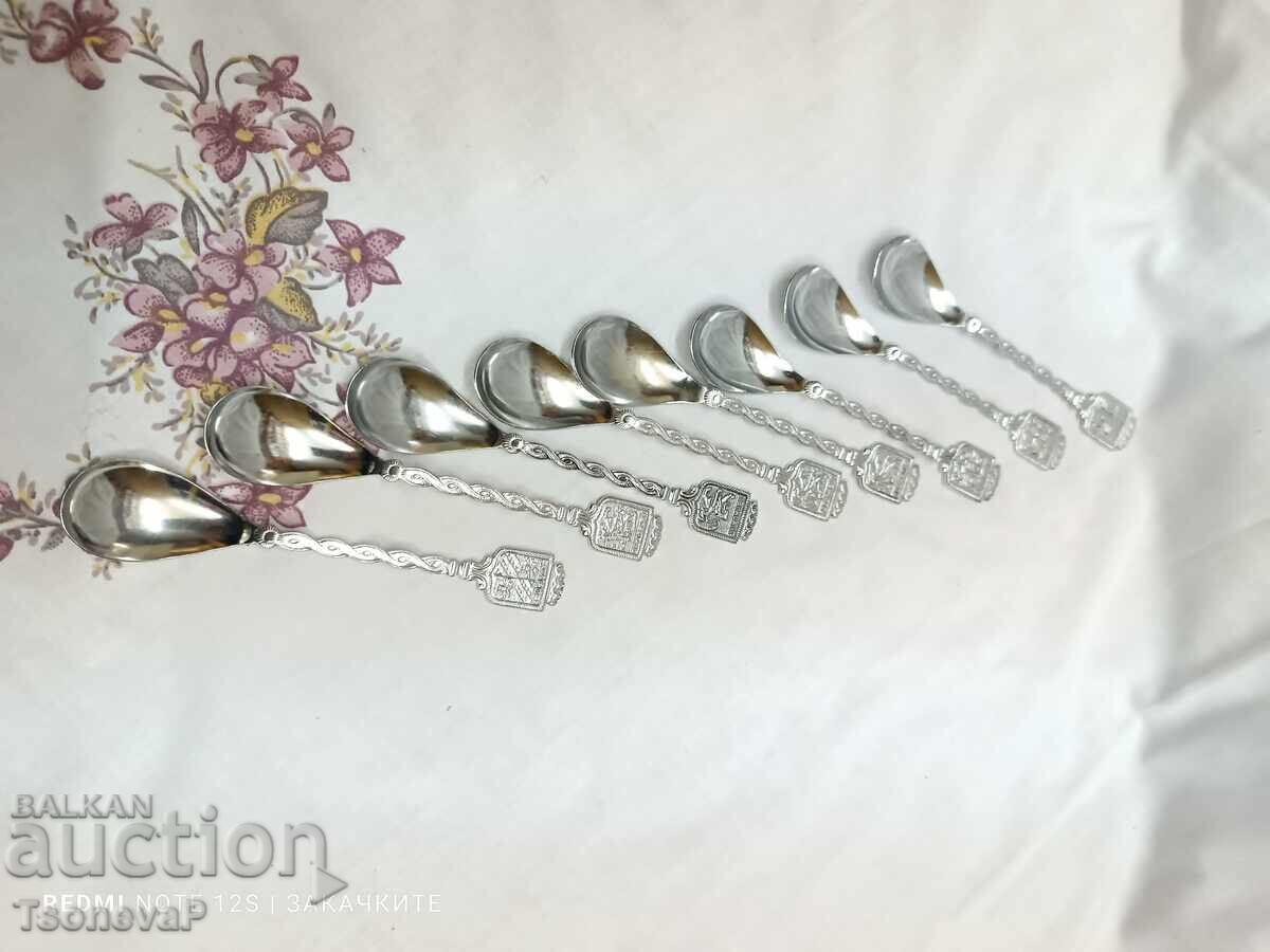 Auction Eight collectible spoons Auction Eight collectible spoons