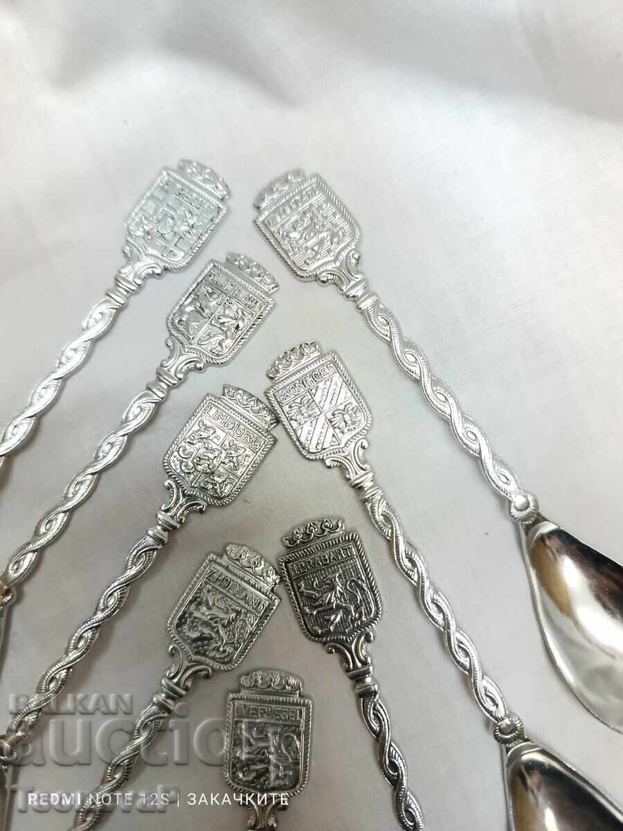 Eight collectible spoons - 5 Eight collectible spoons - 5
